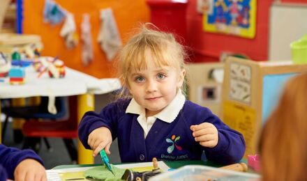 Child playing with play doh