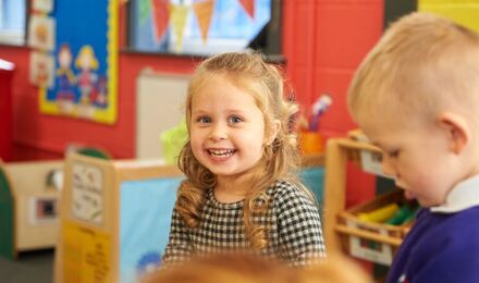 Child smiling at camera