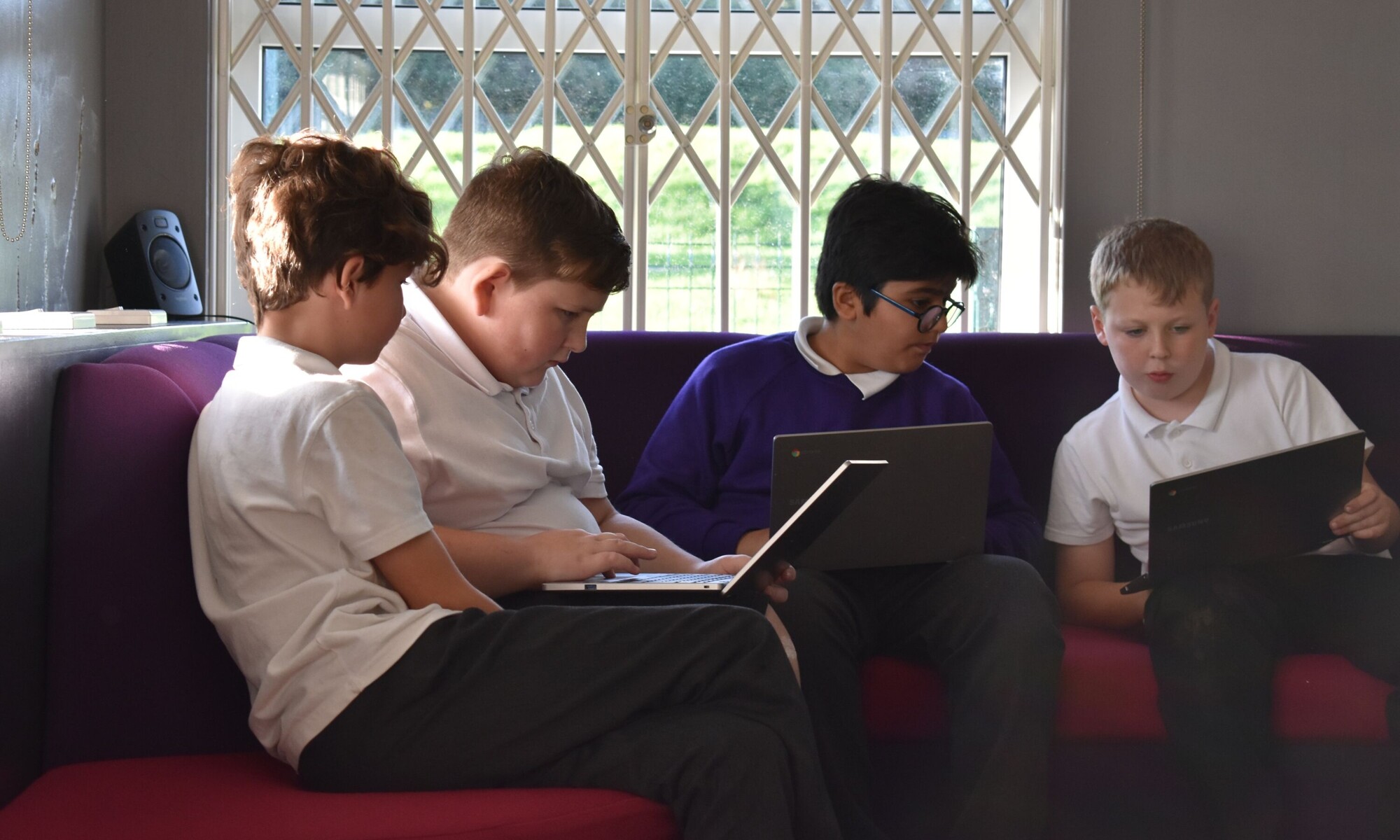 Pupils working on laptops